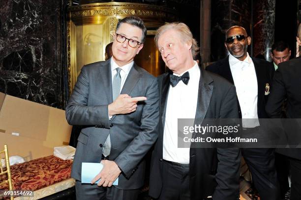 Comedian Stephen Colbert and photographer Patrick McMullan attend the Gordon Parks Foundation Awards Dinner & Auction at Cipriani 42nd Street on June...