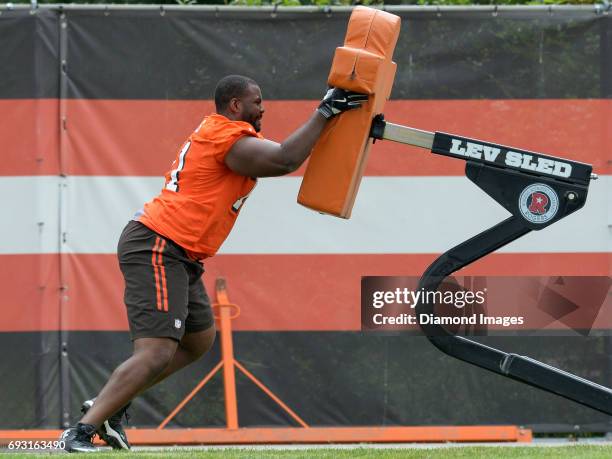 Offensive lineman Matt McCants of the Cleveland Browns pushes a sled after an OTA practice on June 6, 2017 at the Cleveland Browns training facility...