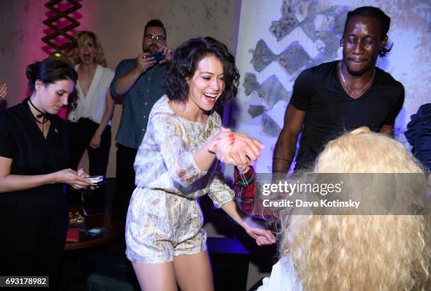 Actress Tatiana Maslany dances at BBC AMERICA's "Orphan Black" Premiere Party at Vandal on June 6, 2017 in New York City.