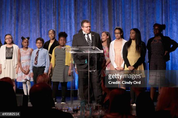 Original Program Director Johnny Rivera speaks onstage with the East Harlem Dreamers during Spirit of the Dream Gala at Intrepid Sea-Air-Space Museum...