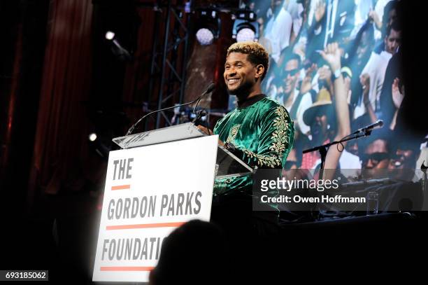 Singer-songwriter Usher speaks onstage during the Gordon Parks Foundation Awards Dinner & Auction at Cipriani 42nd Street on June 6, 2017 in New York...