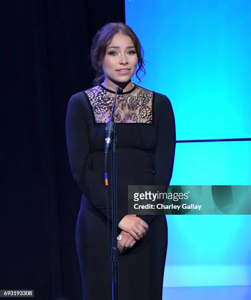 Actor Jessica Parker Kennedy speaks onstage during the 42nd Annual Gracie Awards, hosted by The Alliance for Women in Media at the Beverly Wilshire...