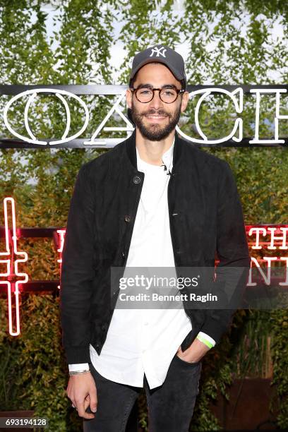 Model Nicolas Simoes attends the Coach and Friends of the High Line Summer Party at High Line on June 6, 2017 in New York City.