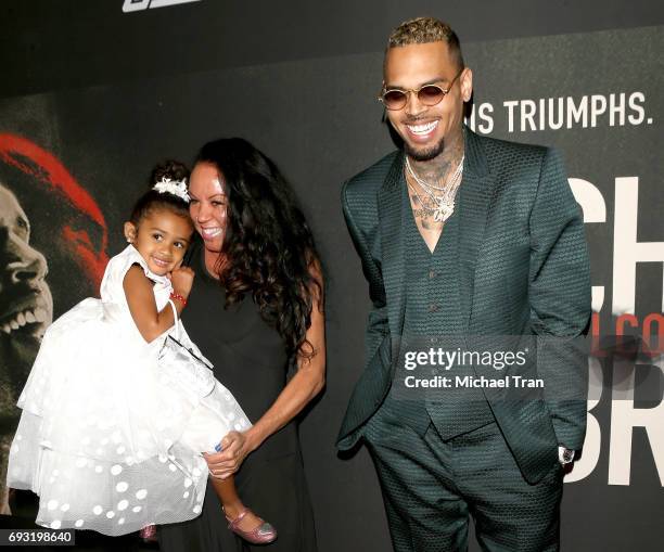 Chris Brown with mom, Joyce Hawkins and his daughter, Royalty Brown attend the Los Angeles premiere of Fathom Events' "Chris Brown: Welcome To My...