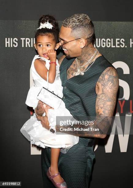 Chris Brown and his daughter, Royalty Brown attend the Los Angeles premiere of Fathom Events' "Chris Brown: Welcome To My Life" held at Regal LA Live...