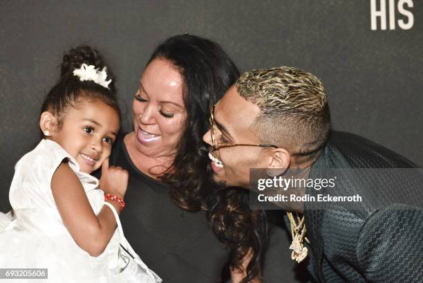 Singer-songwriter Chris Brown , mother Joyce Hawkins, and daughter Royalty Brown attend the premiere of "Chris Brown: Welcome to My Life" at Regal LA...