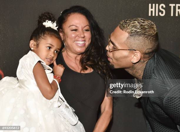 Singer-songwriter Chris Brown , mother Joyce Hawkins, and daughter Royalty Brown attend the premiere of "Chris Brown: Welcome to My Life" at Regal LA...