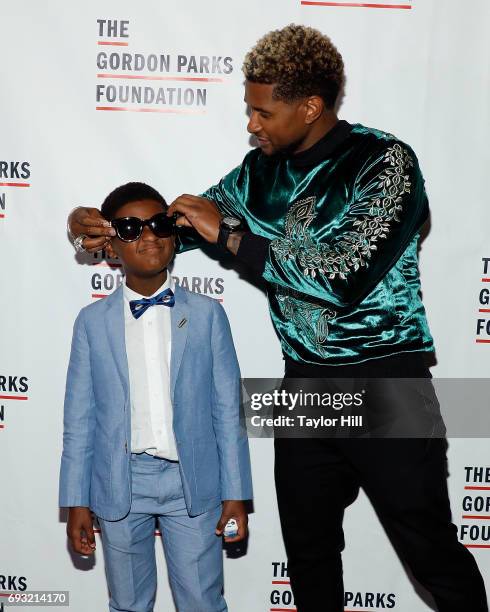 Naviyd Ely Raymond and Usher Raymond attend the 2016 Gordon Parks Foundation Annual Gala at Cipriani 42nd Street on June 6, 2017 in New York City.