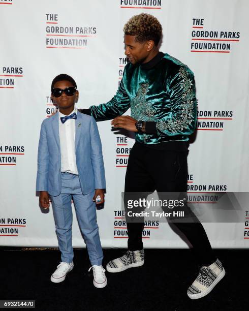 Naviyd Ely Raymond and Usher Raymond attend the 2016 Gordon Parks Foundation Annual Gala at Cipriani 42nd Street on June 6, 2017 in New York City.