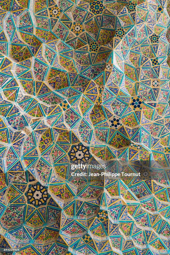 Painted tiles mosaic on the ceiling of a mosque entrance vault in Shiraz, Fars Province, Iran