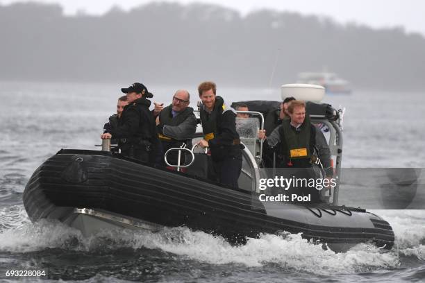Prince Harry travels in an Australian Navy inflatable boat during a sailing demonstration on Sydney Harbour on June 7, 2017 in Sydney, Australia....