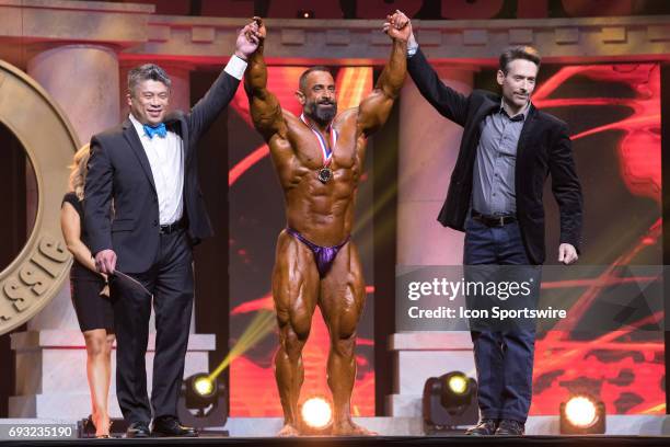 Guy Cisternino is awarded fourth place in the Arnold Classic 212 as part of the Arnold Sports Festival on March 3 at the Greater Columbus Convention...