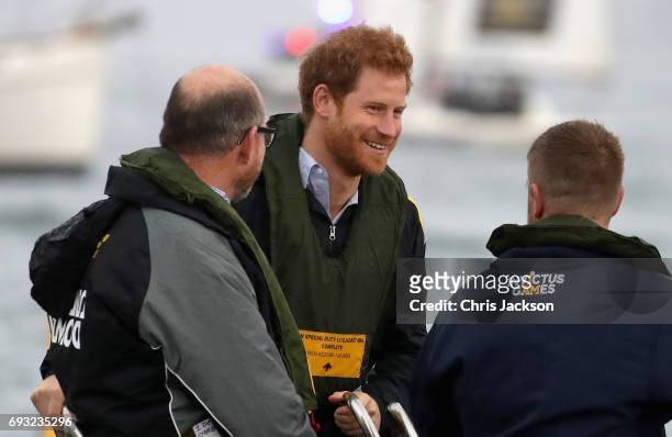 Patron of the Invictus Games Foundation Prince Harry watches an Invictus Games Sydney 2018 Sailing Event in Sydney Harbour on June 7, 2017 in Sydney,...