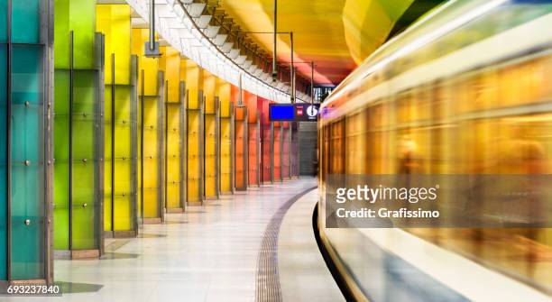 colourful subway station in munich germany - munich stock pictures, royalty-free photos & images