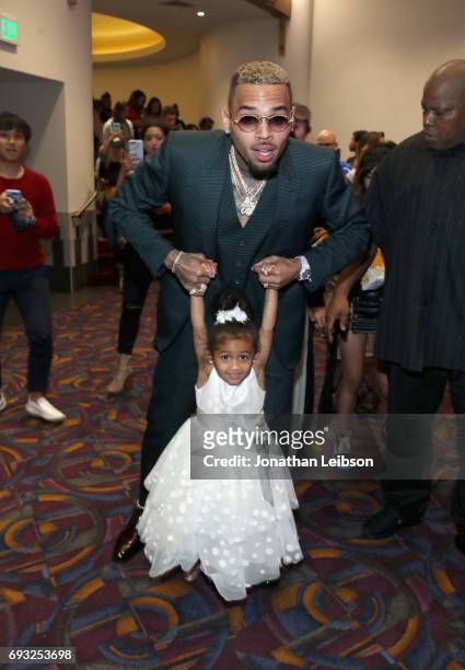 Singer Chris Brown and daughter Royalty attend the Premiere Of Riveting Entertainment's "Chris Brown: Welcome To My Life" at L.A. LIVE on June 6,...