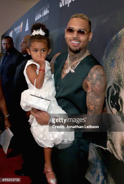 Singer Chris Brown and his daughter Royalty attend the Premiere Of Riveting Entertainment's "Chris Brown: Welcome To My Life" at L.A. LIVE on June 6,...