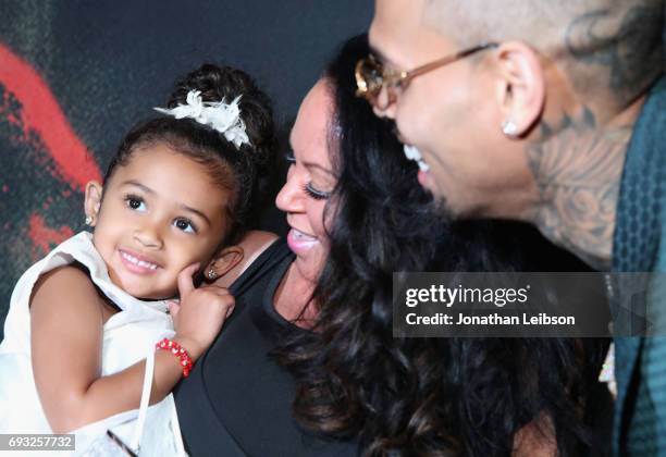 Royalty , Joyce Hawkins and Chris Brown attend the Premiere Of Riveting Entertainment's "Chris Brown: Welcome To My Life" at L.A. LIVE on June 6,...