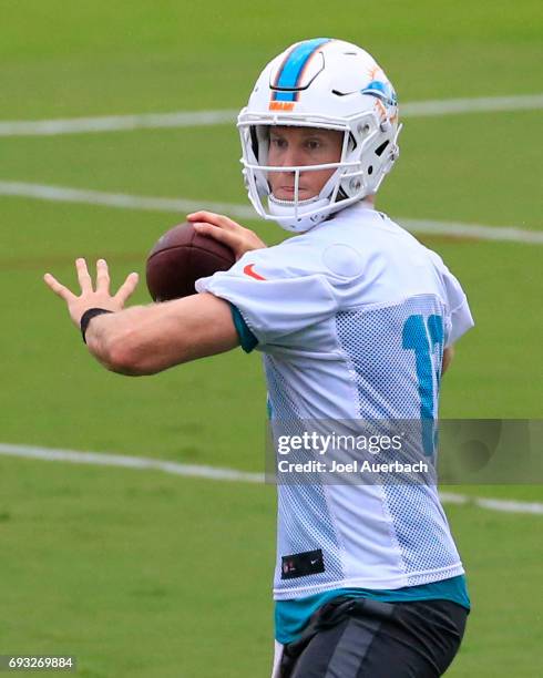 Ryan Tannehill of the Miami Dolphins throws the ball during the teams OTA's on June 5, 2017 at the Miami Dolphins training facility in Davie, Florida.