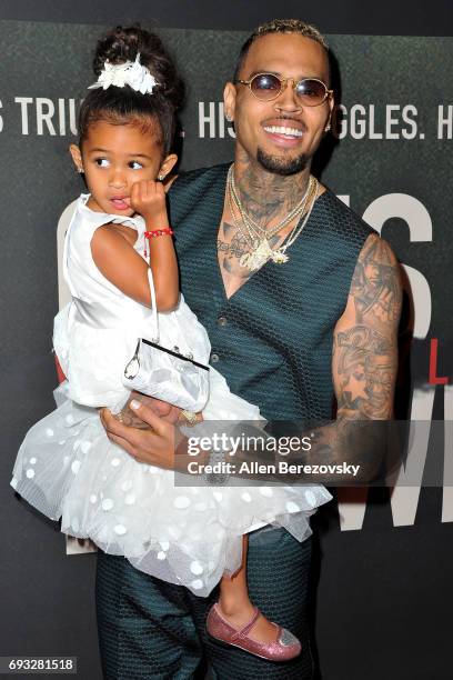 Singer-songwriter Chris Brown and daughter Royalty Brown attend the premiere of Fathom Events' "Chris Brown: Welcome To My Life" at Regal LA Live...