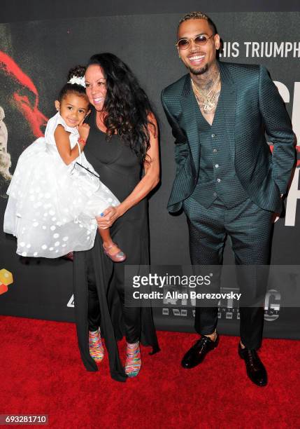Chris Brown with mom, Joyce Hawkins and his daughter, Royalty Brown attend the premiere of Fathom Events' "Chris Brown: Welcome To My Life" at Regal...