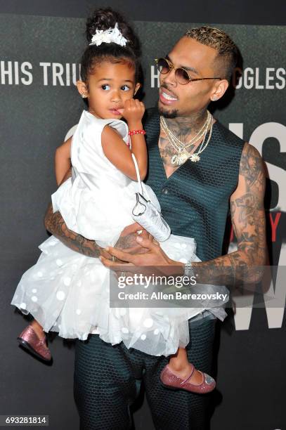 Singer-songwriter Chris Brown and daughter Royalty Brown attend the premiere of Fathom Events' "Chris Brown: Welcome To My Life" at Regal LA Live...