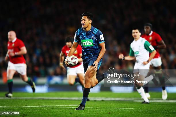 Rieko Ioane of the Blues makes a break during the match between the Auckland Blues and the British & Irish Lions at Eden Park on June 7, 2017 in...