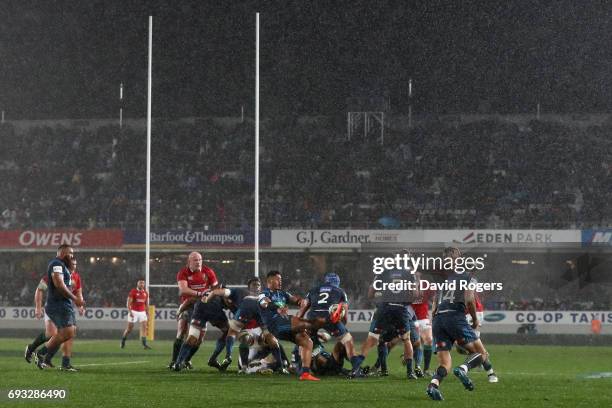 Augustine Pulu of the Blues clears the ball as heavy rain falls during the 2017 British & Irish Lions tour match between the Blues and the British &...