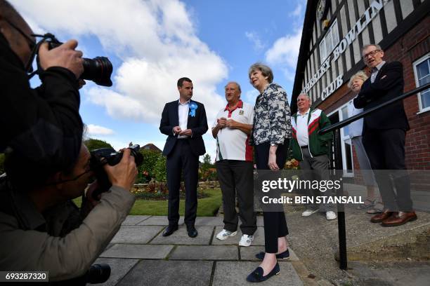 Britain's Prime Minister Theresa May and her husband Philip visit Atherley Bowling Club during an election campaign visit in Southampton, southern...