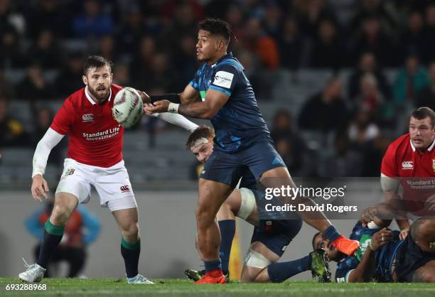 Augustine Pulu of the Blues passes the ball out during the 2017 British & Irish Lions tour match between the Blues and the British & Irish Lions at...