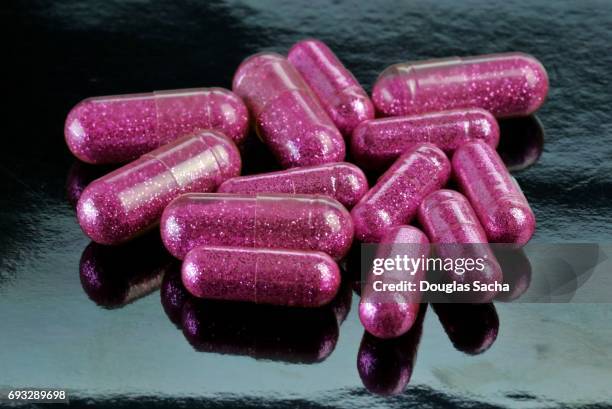 close up of designer club drug pills - mdma stock pictures, royalty-free photos & images