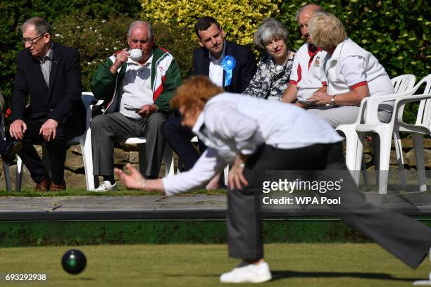 Britain's Prime Minister Theresa May and her husband Philip visit Atherley Bowling Club during an election campaign visit on June 7, 2017 in...
