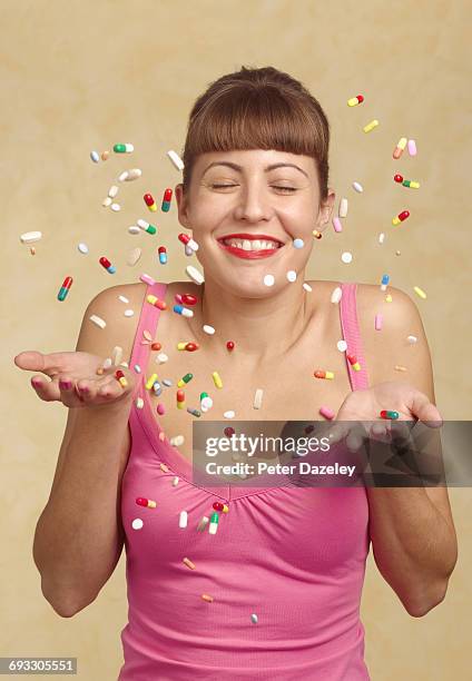 throwing pills in the air - relief emotion stock pictures, royalty-free photos & images