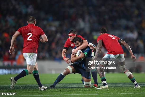 Steven Luatua of the Blues is tackled during the match between the Auckland Blues and the British & Irish Lions at Eden Park on June 7, 2017 in...