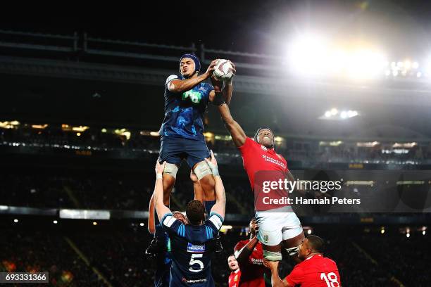 Gerard Cowley-Tuioti of the Blues competes against Maro Itoje of the Lions in the lineout during the match between the Auckland Blues and the British...