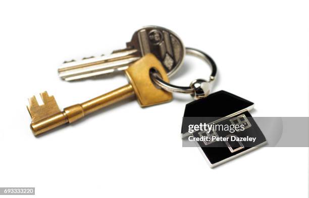 new house, house keys on white - house key stock-fotos und bilder