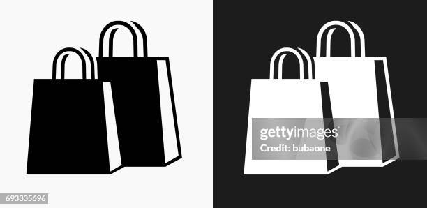 shopping bags icon on black and white vector backgrounds - shopping bags stock illustrations