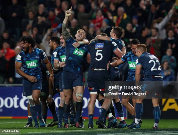 Sonny-Bill Williams of the Blues celebrates with team mates after their victory during the match between the Auckland Blues and the British & Irish...