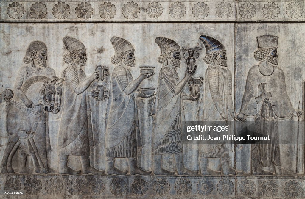 Bas-relief from the Apadana depicting Armenians bringing their famous wine to the king,  Ancient City of Persepolis, Shiraz, Fars Province, Iran