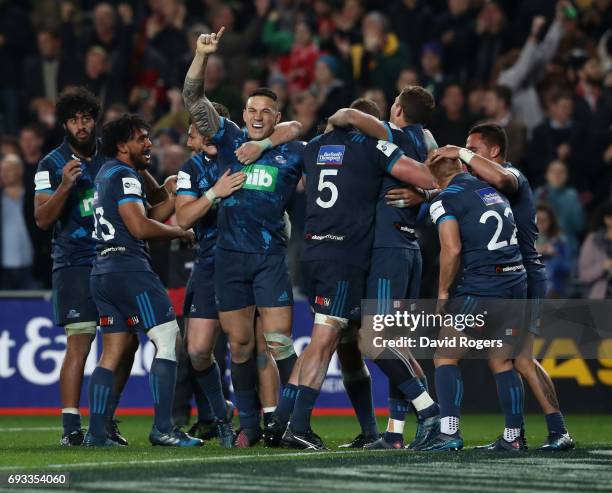 Sonny-Bill Williams of the Blues celebrates with team mates after their victory during the match between the Auckland Blues and the British & Irish...