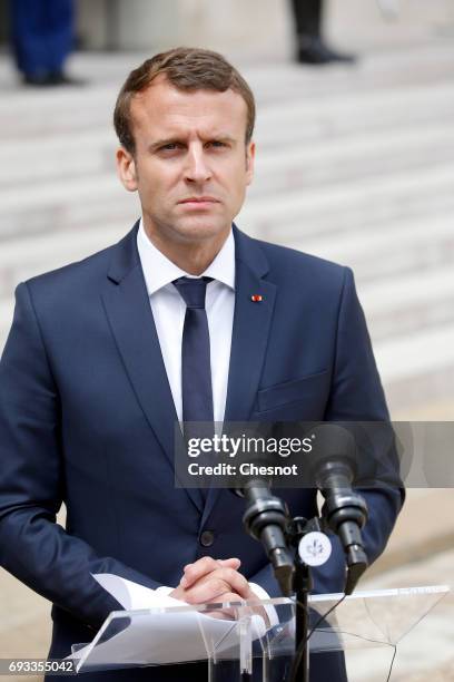 French President Emmanuel Macron makes a statement next to Danish Prime Minister Lars Lokke Rasmussen prior to their meeting at the Elysee...