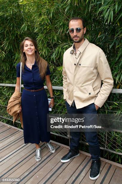 Host Ophelie Meunier and actor Arie Elmaleh attend the 2017 French Tennis Open - Day Eleven at Roland Garros on June 7, 2017 in Paris, France.