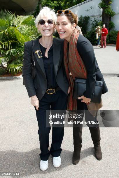 Actress Tonie Marshall and journalist Daphne Roulier attend the 2017 French Tennis Open - Day Eleven at Roland Garros on June 7, 2017 in Paris,...