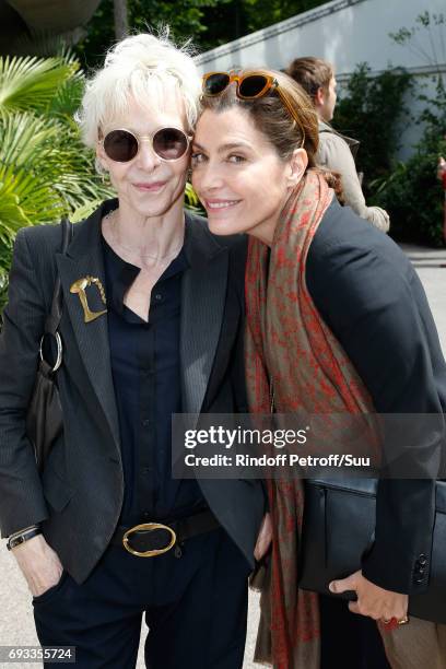 Actress Tonie Marshall and journalist Daphne Roulier attend the 2017 French Tennis Open - Day Eleven at Roland Garros on June 7, 2017 in Paris,...