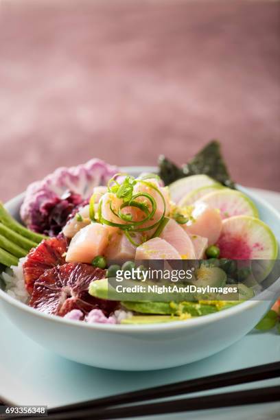 buddha poke bowl with raw fish and fresh vegetables - dolphin fish imagens e fotografias de stock