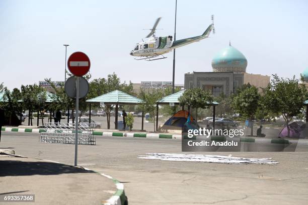 Helicopter belongs to Iranian police patrols at the site after gunmen opened fire at Irans parliament and the shrine of Ayatollah Khomeini in the...