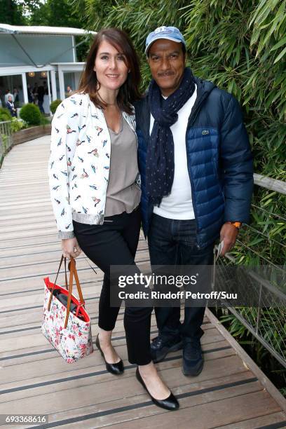 Actor Pascal Legitimus and his wife Adriana Santini attend the 2017 French Tennis Open - Day Eleven at Roland Garros on June 7, 2017 in Paris, France.