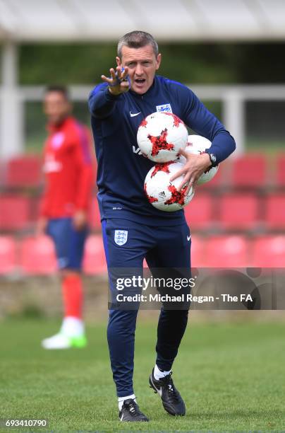 Aidy Boothroyd the manager of England U21 directs his players during the England U21 training session at St Georges Park on June 7, 2017 in...