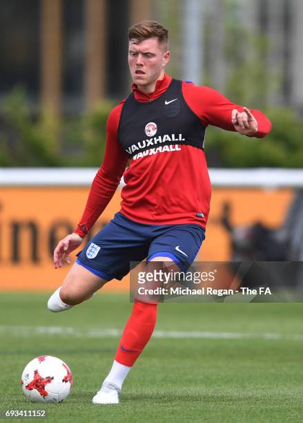 Alfie Mawson of England U21 passes the ball during the England U21 training session at St Georges Park on June 7, 2017 in Burton-upon-Trent, England.