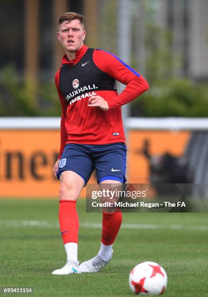 Alfie Mawson of England U21 passes the ball during the England U21 training session at St Georges Park on June 7, 2017 in Burton-upon-Trent, England.