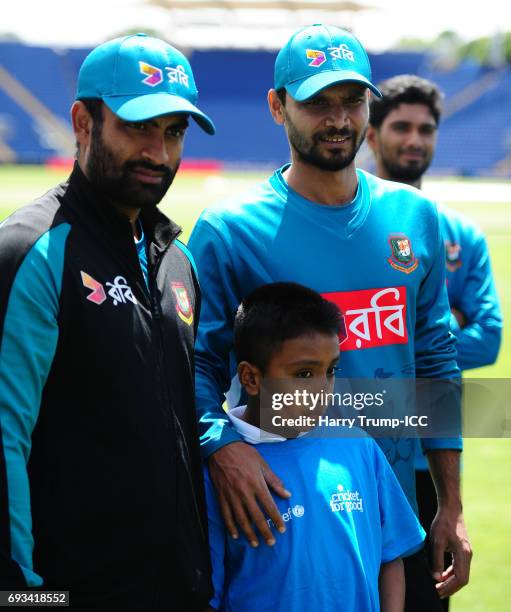 Mashrafe Mortaza and Tamim Iqbal of Bangladesh look on during the ICC Champions Trophy: Cricket for Good- Bangladesh event at the SWALEC Stadium on...